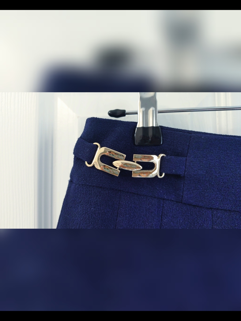 Navy Pleated Mini Skirt with Gold Buckle Accents - Picture 3 of 7